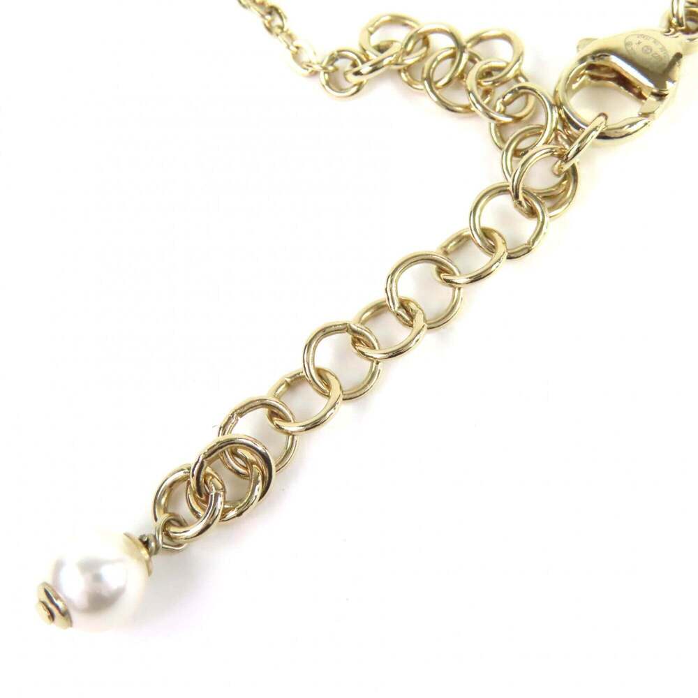 CHANEL Gold Pearl Logo Necklace - Picture 7 of 8